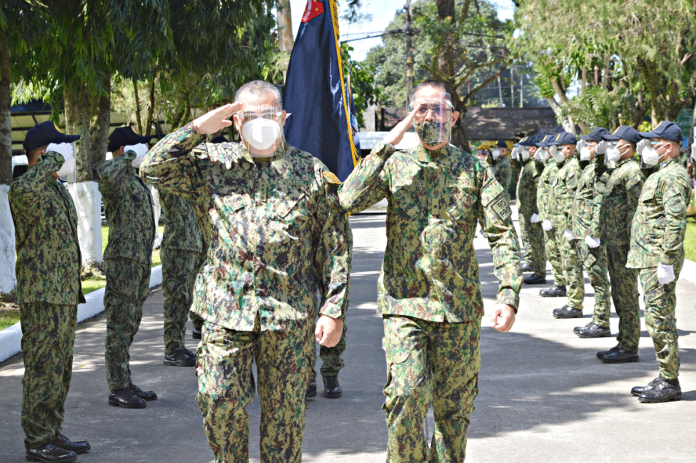 Western Visayas top cop Brigadier General Rolando Miranda (right) leads the arrival honors for Philippine National Police chief General Debold Sinas during the latter’s visit at Camp Alfredo Montelibano Sr. in Bacolod City on Feb. 7. NOCCPO