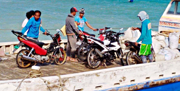 A cargo boat transports Boracay Island-bound motorcycles from mainland Malay, Aklan. PHOTO BY THE MALAY TRANSPORTATION OFFICE