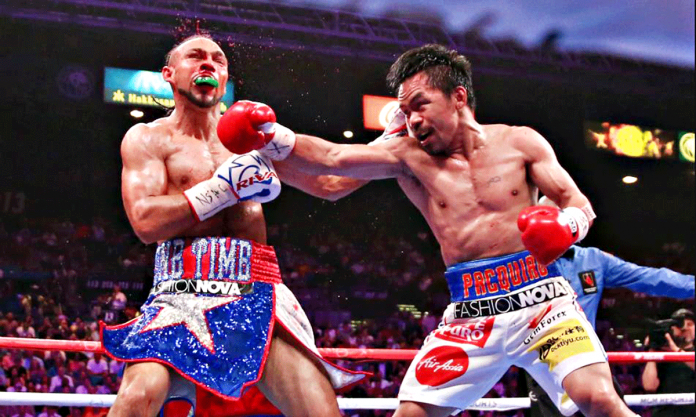 Manny Pacquiao lands a punch on Keith Thurman during their world title clash last July, 2019. MP Promotions