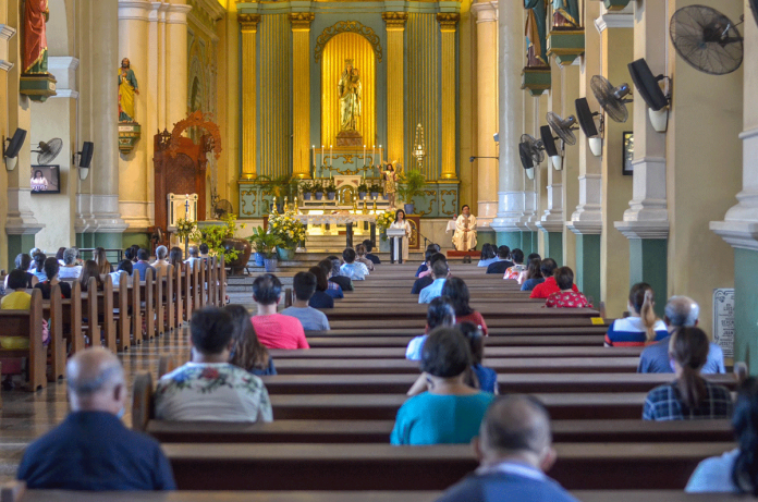 Devotees attend a mass in Jaro Metropolitan Cathedral in Iloilo City. Churchgoers observe physical distancing to prevent the spread of coronavirus disease 2019. In “NCR plus” churches are allowed by the Inter-Agency Task Force for the Management of Emerging Infectious Disease to conduct a “once-a-day” religious gathering during Holy Week. PANAY NEWS PHOTO