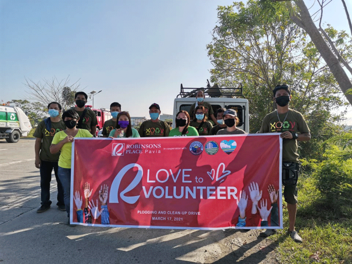 Volunteers strike a pose during the clean-up drive and plogging activity in Pavia, Iloilo conducted on March 17.