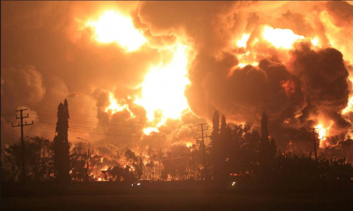 Smoke rises during fire at Pertamina's oil refinery in Balongan, Indramayu regency, West Java province, Indonesia, March 29, 2021. ANTARA FOTO/DEDHEZ ANGGARA/ VIA REUTERS