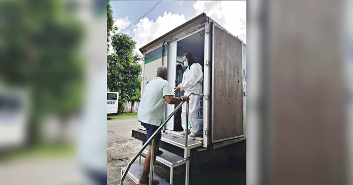 TB SCREENING. A healthcare personnel ushers an elderly in an x-ray mobile van for tuberculosis screening. According to the Department of Health in Western Visayas, some of last year’s interventions against the TB disease were hampered due to restrictions brought about by the coronavirus pandemic. PHO AKLAN