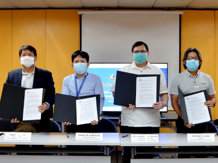 Present during the loan signing were (from left) CMC Vice President for Marketing Rommel T. Juan, DBP First Vice President Daniel M. Gonzales, DBP Executive Vice President Jose Gabino D. Dimayuga, and CMC President Raphael T. Juan.