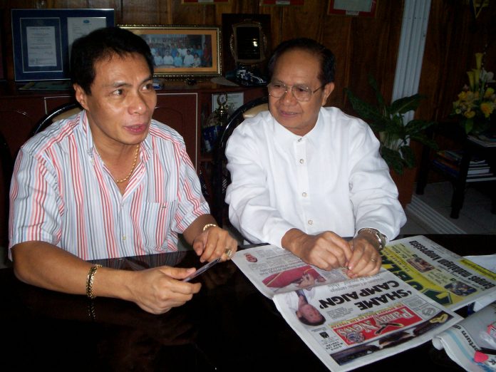 Dr. Juanito Acanto, then president of Central Philippine University with Panay News founder Danny G. Fajardo