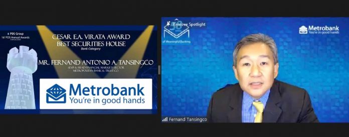 Metrobank Head of Financial Markets Sector Fernand Antonio Tansingco receives the recognition during the virtual awarding ceremony of the PDS Awards.