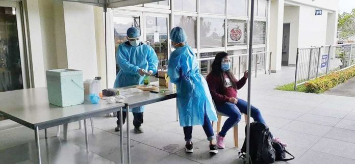 These medical frontliners are stationed at the arrival area of the Iloilo International Airport in Cabatuan, Iloilo to test the arriving residents. President Rodrigo Duterte says he will not ease the quarantine protocols for the returning overseas Filipino workers due to presence of foreign variants of coronavirus disease 2019 in the country. JERRY TREÑAS/FACEBOOK