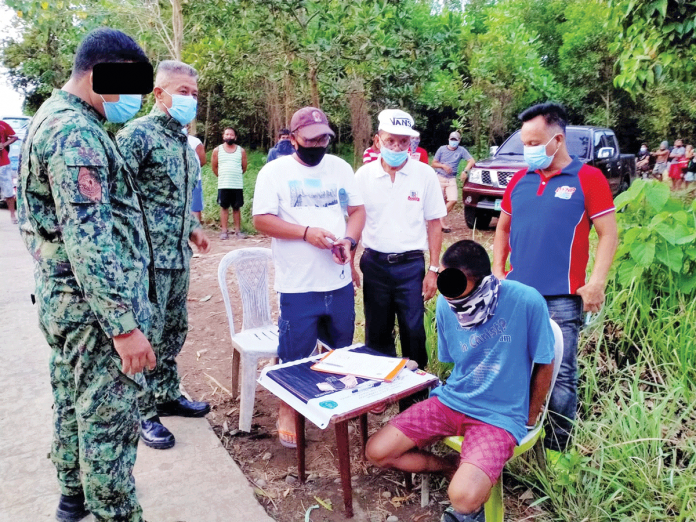 Police collar a suspected drug personality in Barangay Purisima, Manapla, Negros Occidental. MANAPLA PNP