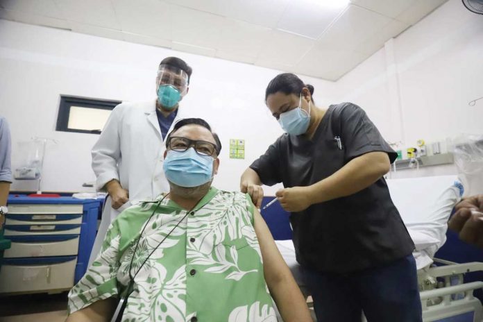 Iloilo City’s Mayor Jerry Treñas gets his first dose of CoronaVac vaccine against coronavirus disease 2019 at the West Visayas State University Medical Center in La Paz district. He said he felt completely fine after the vaccination. ARNOLD ALMACEN/CMO