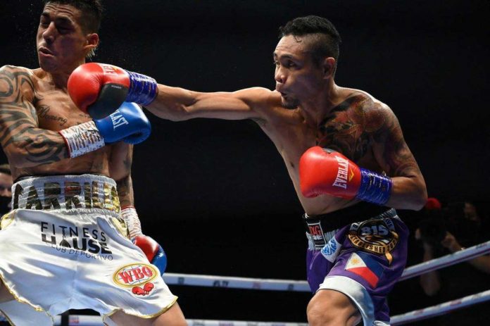 Negrense boxer Donnie Nietes (right) gives a straight right-hand punch on the chin of Colombian fighter Pablo Carrillo (left) during their WBO international super flyweight bout on Sunday at Caesars Palace Bluewaters in Dubai, United Arab Emirates. D4G BOXING PROMOTIONS