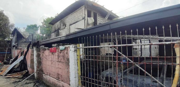 FRIDAY FIRE . A mother and son were killed in a fire that hit their home in Barangay Poblacion, Leganes, Iloilo yesterday. Authorities have yet to determine the cause of the blaze. JAP FAJARDO/PN