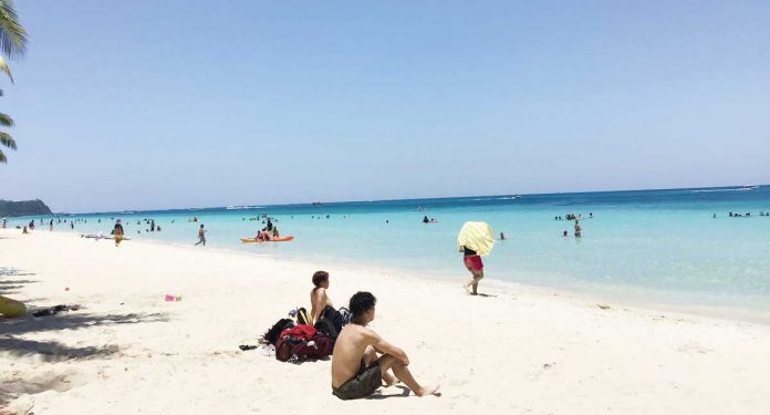 Boracay Island is experiencing a surge in coronavirus disease 2019 cases. A “superspreader” party at a bar there on March 10 is being blamed.