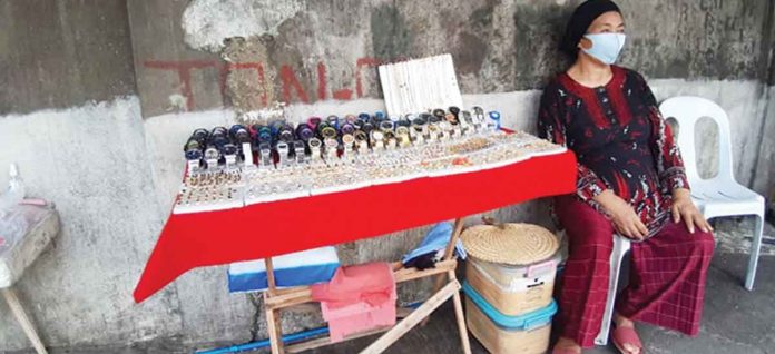 Ramla Hajimanan, 60, of Barangay Divinigracia, La Paz, Iloilo City says her accessory business has been hit hard by the coronavirus pandemic.