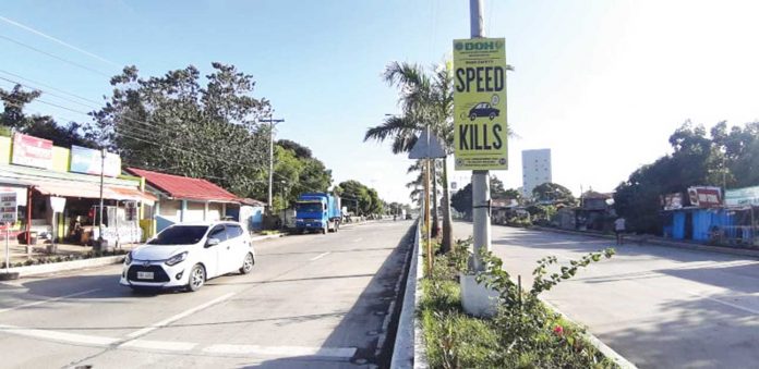 A road safety sign is prominently displayed along the national highway in Barangay Mali-ao, Pavia, Iloilo. The Sangguniang Panlalawigan is urging concerned authorities to put up more warning signs in accident-prone areas. Panay News Photo