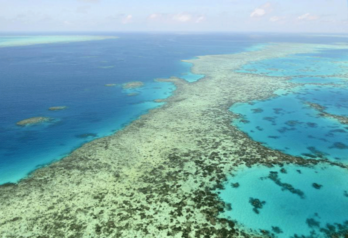 This aerial photo shows the Great Barrier Reef in Australia. On Tuesday, Australia said it will fight a recommendation for the Great Barrier Reef to be listed as in danger of losing its World Heritage values due to climate change. KYODO NEWS VIA AP