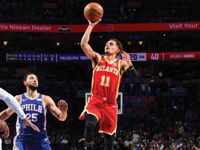 Atlanta Hawks' Trae Young goes for a floater shot against Philadelphia 76ers during Game 5 of their Eastern Conference semifinals on Wednesday at the Wells Fargo Center in Philadelphia, Pennsylvania. GETTY IMAGES