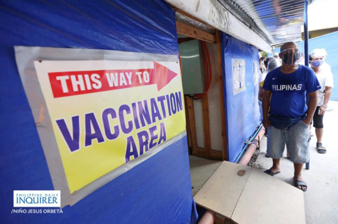 The inoculation of tricycle drivers, vendors and media practitioners belonging to the A4 priority group start at the Mandaluyong City Medical Center Mega Vaccination Site on Monday, June 7. NIÑO JESUS ORBETA/PHILIPPINE DAILY INQUIRER