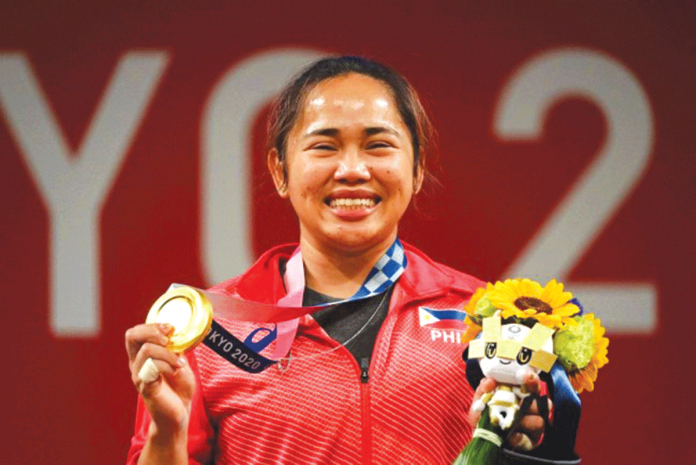 "Hindi ako magsa-stop (sa weightlifting) kasi kaya ko pa. Nakita ko ang galing ko at may ibibigay pa ako para sa Pilipinas," says weightlifter Hidilyn Diaz. VINCENZO PINTO/AFP VIA GETTY IMAGES