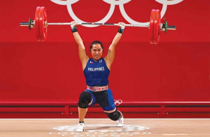 1st Olympic Gold Weightlifter Hidilyn Diaz Makes Historic Win For Ph