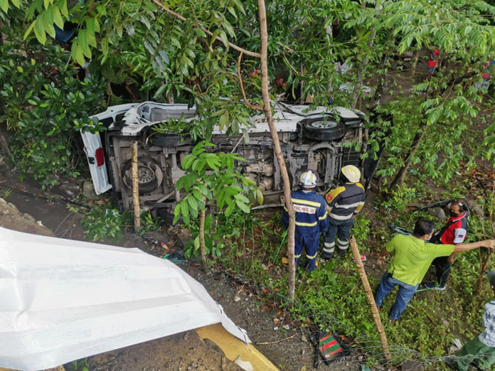 A van turned turtle in Sitio Lag-asan Bridge, Barangay Tinam-paan, Cadiz City, Negros Occidental. Police have yet to disclose if there were other victims but a couple from Sagay City reportedly survived the accident. PHOTO BY CADIZ RESCUE (ALERT)