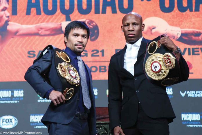 Manny Pacquiao (left) and WBA welterweight champion Yordenis Ugas face off in a pre-fight press conference on Wednesday (Thursday in the Philippines) ahead of their August 21 battle at the T-Mobile Arena in Las Vegas, Nevada. ENDELL ALINEA