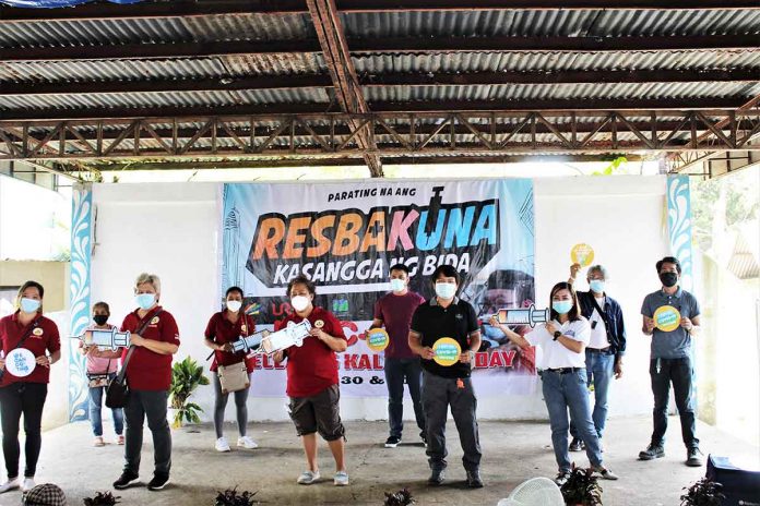 Universal Robina Corporation Sugar and Renewables workforce in SONEDCO Sugar Mill after getting vaccinated.