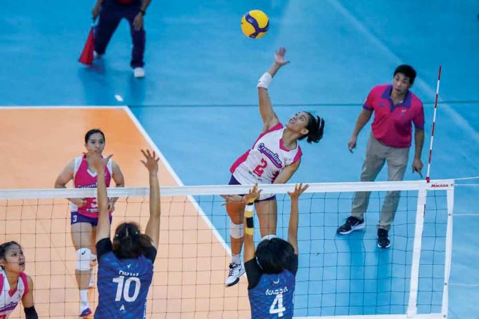 Creamline Cool Smashers’ Alyssa Valdez spikes the ball against Chery Tiggo Crossovers’ Maika Ortiz (10) and Jasmine Nabor (4) during Game 1 of the Premier Volleyball League Open Conference finals last night in Bacarra, Ilocos Norte. Valdez top-scored for the Cool Smashers with 21 points, all from attacks. PVL MEDIA BUREAU