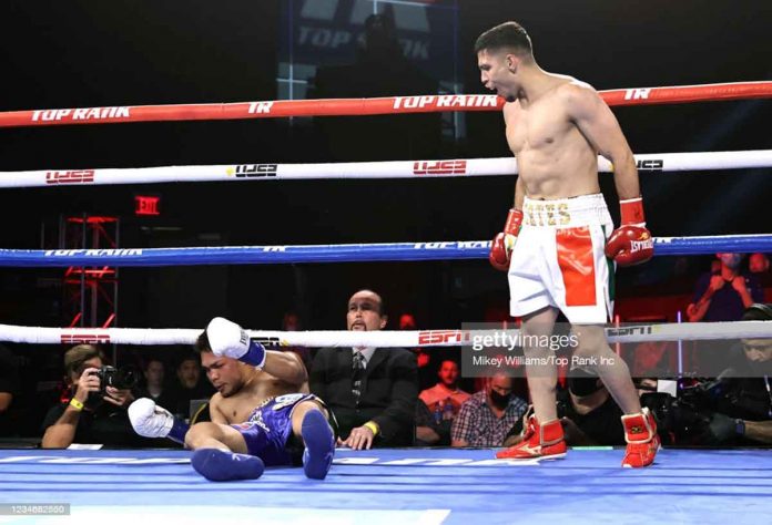 Genesis Servania is down on the canvas after hit with a right hook to the jaw and left straight to the face by Andres Cortes in the first round of their boxing match on Sunday at the Hard Rock Hotel and Casino in Tulsa, Oklahoma City. GETTY IMAGES