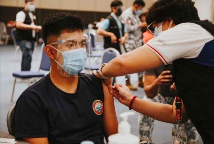 A seafarer is inoculated with the Moderna’s COVID-19 vaccine during a special vaccination drive organized by the Maritime Industry Authority in Olongapo City. OLONGAPO CITY INFORMATION CENTER