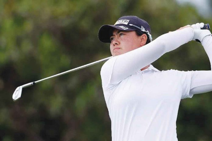 Yuka Saso competes in the third round of the 2020 Tokyo Olympics women's single stroke play on Friday at the Kasumigaseki Country Club in Tokyo, Japan. Saso moved up 14 spots to the joint top 20 while Bianca Pagdanganan slid down by two notches and occupied the top 29. AFP