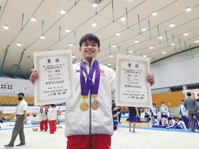 Carlos Edriel Yulo earns gold at the 2021 All-Japan Senior and Masters Gymnastics Championships by scoring 15.300 points in the floor exercise event. He also won a bronze medal in the vault competition. MUNEHIRO KUGIMIYA