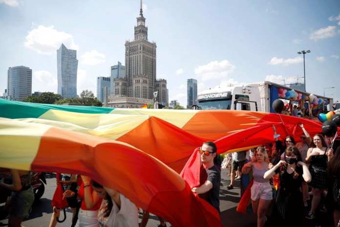 People attend the “Equality Parade” rally in support of the LGBT community, in Warsaw, Poland. REUTERS/KACPER PEMPEL