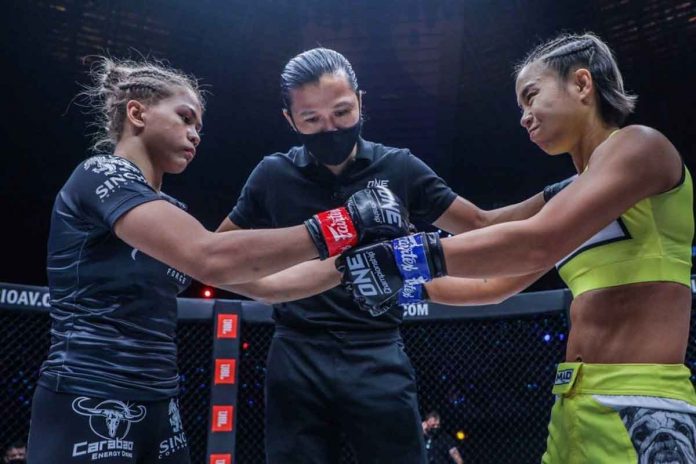 Denice Zamboanga (left) and Ham Seo-hee touch gloves prior to their Atomweight Grand Prix encounter last week at the Singapore Indoor Stadium, where Ham was declared the winner. Following a review of the fight, ONE Championship's Competition Committee ruled that Ham prevailed over the Filipina fighter. ONE CHAMPIONSHIP