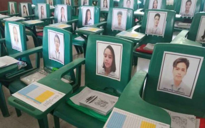 FACE TO FACE WITH PHOTOS. The classroom of Grade 9-Blueberry of Calinog National Comprehensive High School in Iloilo province is ready for the resumption of classes today. Because face-to-face classes remain suspended, class adviser Jessie Comprendio has placed the photos of his learners on chairs so he could identify them should they chance upon each other. PHOTO COURTESY OF JESSIE S. COMPRENDIO