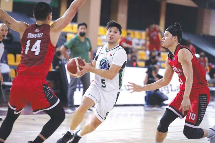 Terrafirma Dyip’s Juan Miguel Tiongson protects the ball from the defense of Barangay Ginebra San Miguel Kings’ Brian Enriquez and Arvin Tolentino during their 2021 PBA Philippine Cup game on Friday. PBA MEDIA BUREAU PHOTO