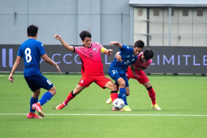 Philippine U-23 Azkals’ Sandro Reyes is held by two South Korean defenders. AFC PHOTO