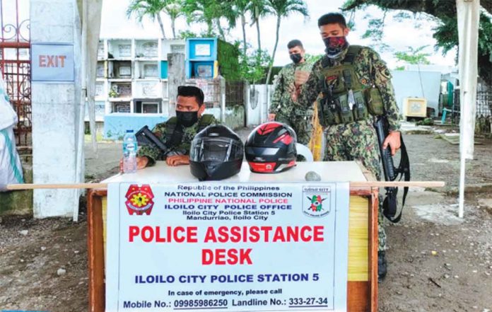 Hundreds of Iloilo cops deployed to cemeteries. RUBY SILUBRICO