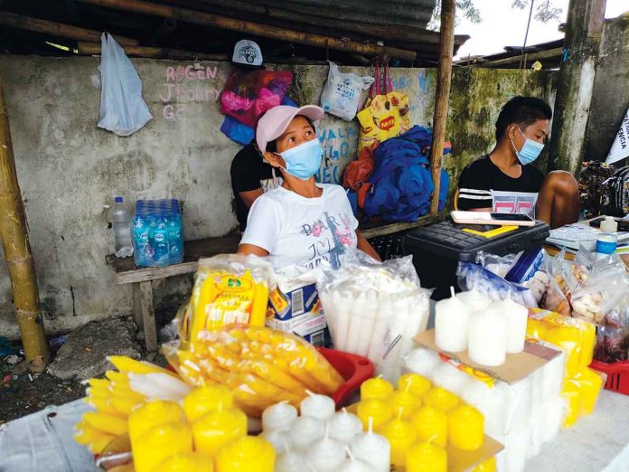 “Pigado gid. Makabenta kami sang P500 sa isa ka adlaw pero laka lang. Kis-a wala gani da nagakalab-ot,” says 30-year candle vendor Flordeleza Regalado of Barangay Oñate de Leon, Mandurriao, Iloilo City. PANAY NEWS PHOTO