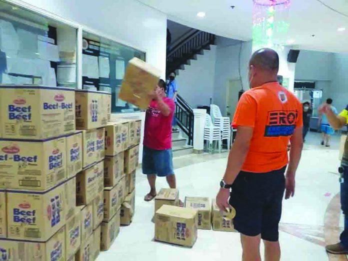 At the provincial capitol of Iloilo, boxes of relief goods are being readied. These will be distributed to evacuation centers where people fleeing super typhoon “Odette” have sought shelter. PANAY NEWS