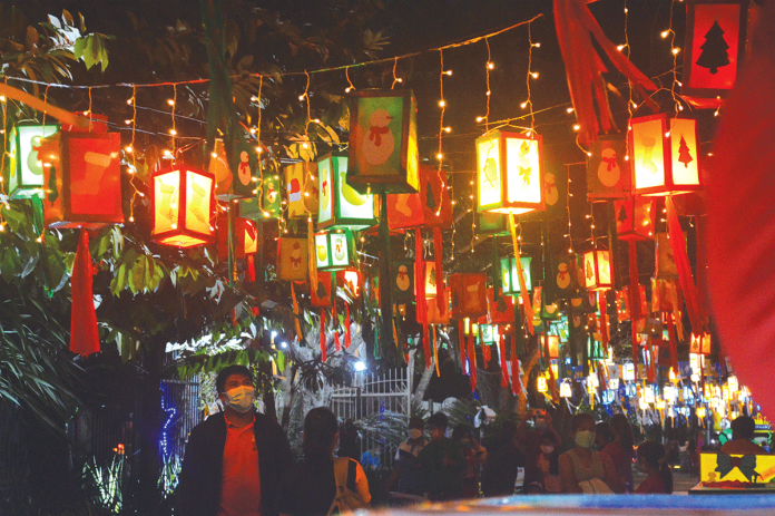 Multicolored Christmas lanterns light up the public plaza of New Lucena, Iloilo. These decors give cheer to residents and visitors as they usher in the Christmas season. The lanterns were crafted by the municipal government’s job hires, employees and volunteers. PANAY NEWS PHOTO