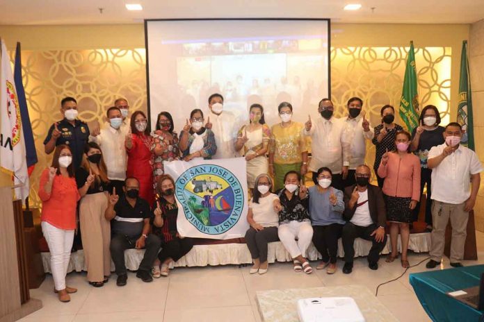 Officials and employees of the municipal government of San Jose, Antique led by Mayor Elmer Untaran (fourth from right, second row) gather during the 2021 Search for Excellence in Local Governance (EXCELL) Awards: Rising Above the Challenge awarding ceremony in Iloilo City. PHOTO FROM THE FACEBOOK PAGE OF MAYOR ELMER UNTARAN