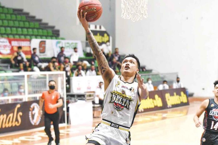 Encho Serrano of Pampanga Delta attacks the basket for a layup. NBL PHOTO