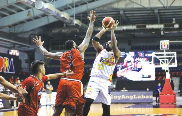 Rain or Shine Elasto Painters’ Henry Walker attempts a fade away basket while being defended by Blackwater Bossing’s Jaylen Bond. PBA MEDIA BUREAU