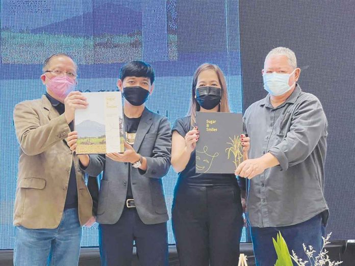 Nov. 30, 2021, Bacolod City. Sugar & Smiles: The Negrense Legacy Beyond 2020 (L-R) Book Launch at the Ayala Malls Capitol Central by the Project Team: executive director J. Albert Gamboa; co-publisher Gen Tomas; marketing director Tere Manalili; project director Benjie Torre. Photo by Ronnie Baldonado