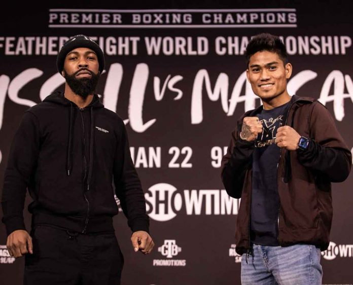 Mark Magsayo (right) and WBC featherweight champ Gary Russell Jr. face to face during the final presser for their title fight in Atlantic City this weekend. PHOTO BY SHOWTIME BOXING