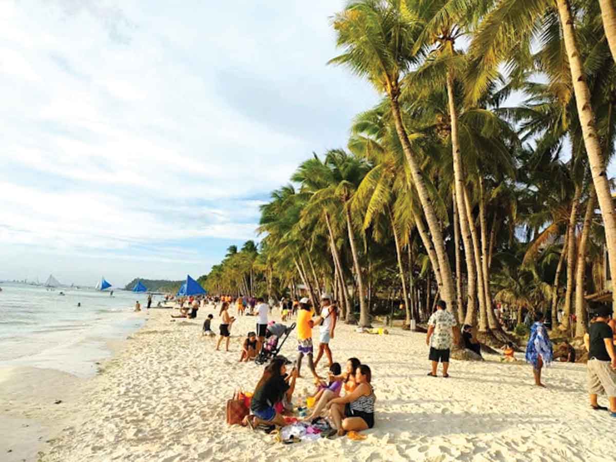 Foreign tourists swarming into Boracay as travel restrictions ease