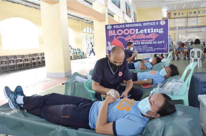 Personnel of the Police Regional Office 6 donate blood for the Western VIsayas Medical Center Regional Blood Bank Center. PRO-6 PHOTO