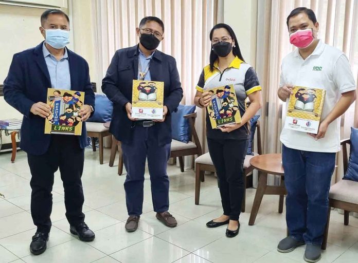 In attendance during the simple ceremonial turnover of the printed modules by GBP for the implementation of the Bulig-Basa project were (from left): Mr. Roel F. Bermejo, PhD, CESO V - Schools Division Superintendent for Division of Iloilo; Mr. Eugenio L. Mallorca, PhD – PSDS, Division English Coordinator and Project Leader; Ms. Lilibeth E. Larupay – Education Program Supervisor in charge of Learning Resource Management System; and Mr. Michael S. Guanco – Community Relations Officer of GBP Panay Site.