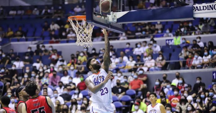 NLEX Road Warriors import Cameron Clark easily scores inside as Alaska Aces defenders look on. PBA MEDIA BUREAU