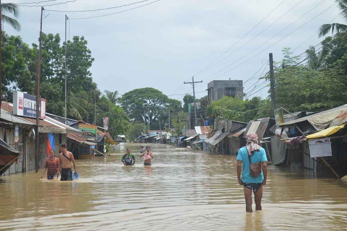 Flash floods hit several municipalities in Western Visayas, particularly in Zarraga, Iloilo were people trapped in their homes. PHOTO BY JAPHET FAJARDO